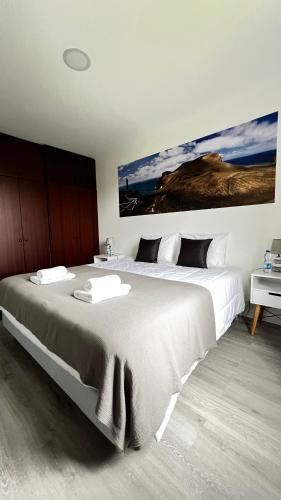 Ένα ή περισσότερα κρεβάτια σε δωμάτιο στο LN GuestHouse