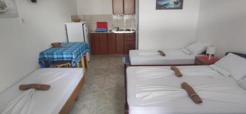 Postel nebo postele na pokoji v ubytování Džodžo Apartments