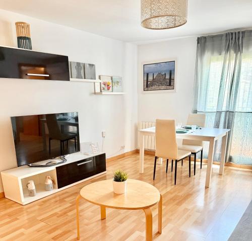TV a/nebo společenská místnost v ubytování Apartamento Ramon Pignatelli