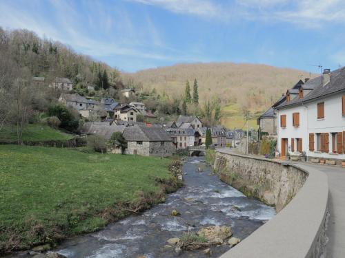a town with a river in a town with houses at Gite la Calabasse in Saint-Lary