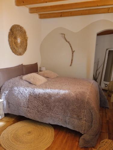 Katil atau katil-katil dalam bilik di Briciole di Pietra B&B