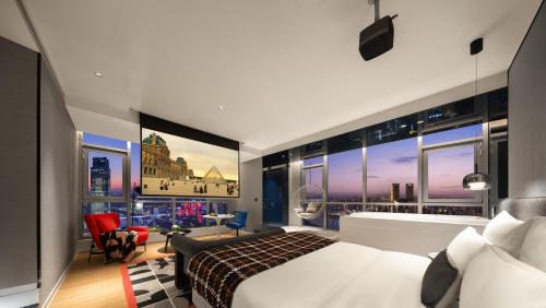 ISEYA Panoramic Hotel - Chongqing Jiefangbei Yunduan Zhiyanにあるシーティングエリア