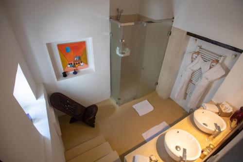 an overhead view of a bathroom with a shower and a sink at Dar Lalzohra in Rabat