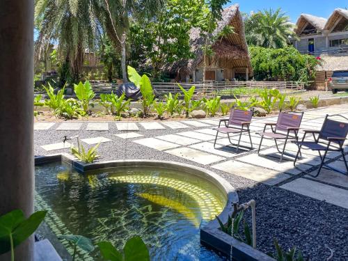 Κήπος έξω από το Baia Nest Villa LAMADANG Suite within Self-Service Villa Near the Beach, Pet Friendly with a Fee