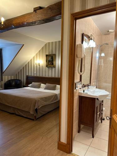 Ένα ή περισσότερα κρεβάτια σε δωμάτιο στο Hotel Belle Epoque