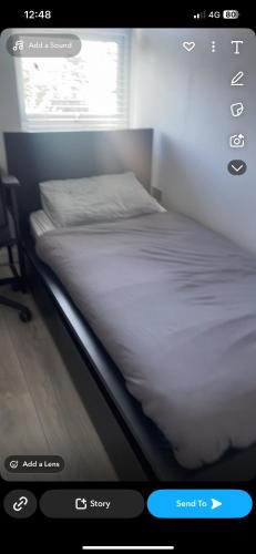 a picture of a bed in a room at A house near Etihad and Manchester town centre in Manchester