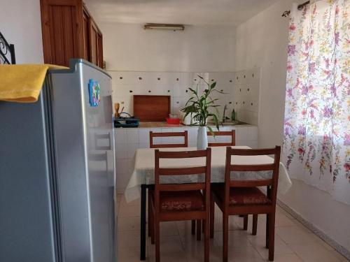 Η κουζίνα ή μικρή κουζίνα στο Calodyne Cozy Condo