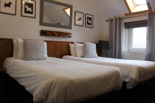 Postel nebo postele na pokoji v ubytování Argyle Guest House