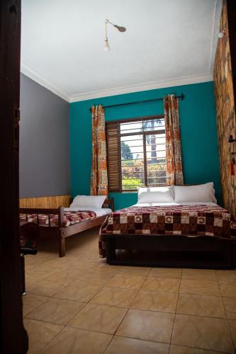 Voodi või voodid majutusasutuse Henotes B&B toas