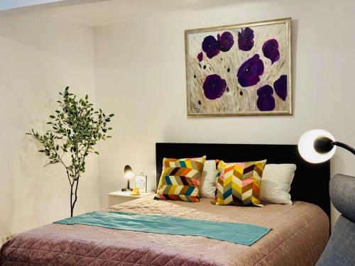 En eller flere senge i et værelse på Joy City Stay Nemoianu 8D