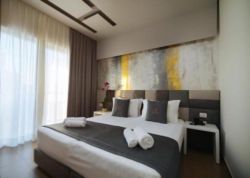 Postel nebo postele na pokoji v ubytování Bonita Classic Hotel & Spa