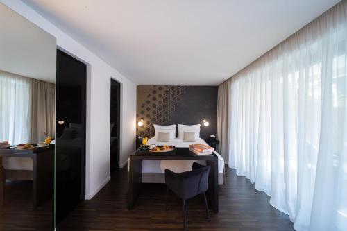 Cama o camas de una habitación en Azur Hotel