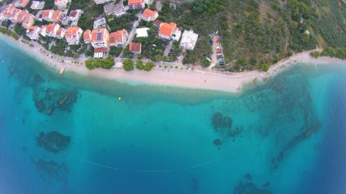 an aerial view of a small island in the ocean at Waterfront Apartments - Tucepi in Tučepi