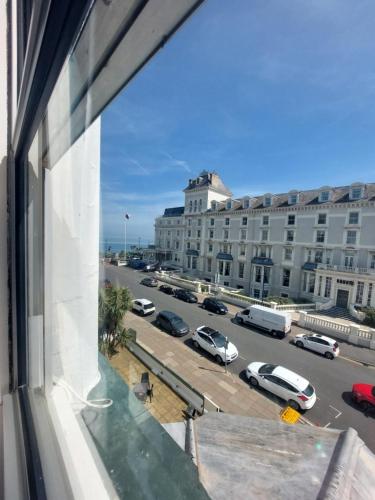a view from a window of a parking lot at White Heather Hotel in Llandudno