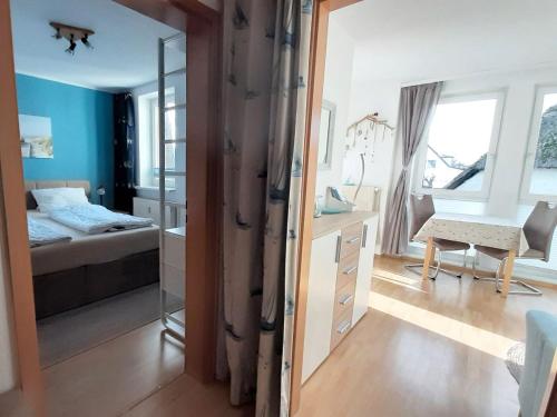 Postel nebo postele na pokoji v ubytování Ferienwohnung Else Boddenkieker