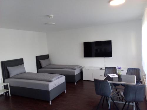 Postel nebo postele na pokoji v ubytování Apartment Metzingen City
