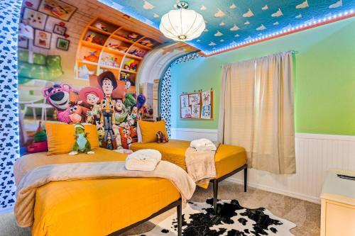 a childs bedroom with aesame street themed ceiling at Brand New Charming Home 9 Miles To Disney in Orlando