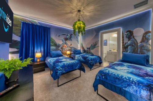 a bedroom with two beds and a painting on the wall at Experience Luxury In Your 11 En-suites Mansion in Orlando