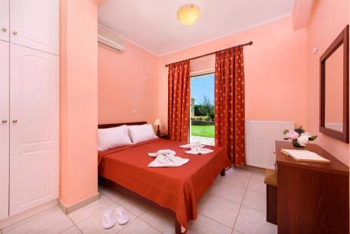 Postel nebo postele na pokoji v ubytování Luxury Corfu Villa Villa Rose Private Pool