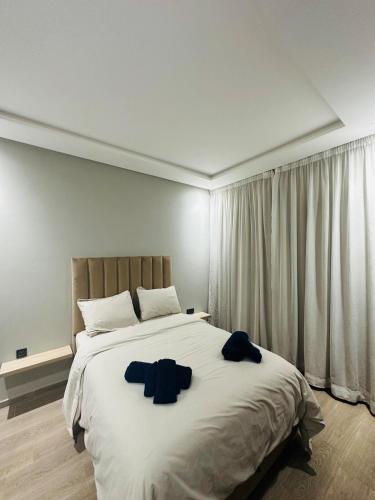 Giường trong phòng chung tại 3 bedroom apartment