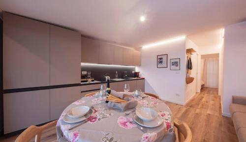 a table in a kitchen with a dining room at Villaggio Brambui Durando in Portacomaro