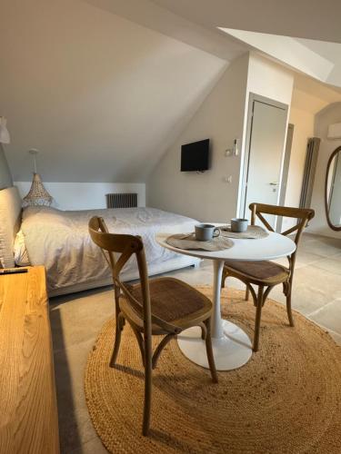 TV a/nebo společenská místnost v ubytování Sweet Village Apartment