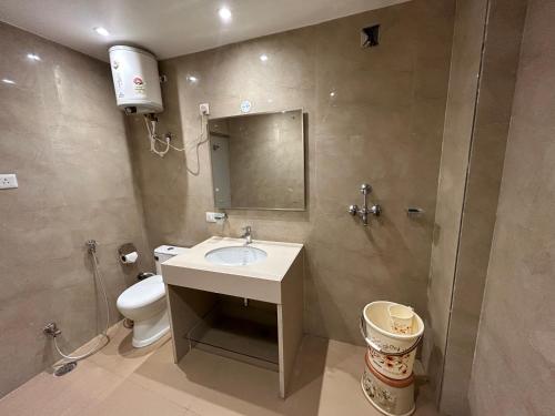 Koupelna v ubytování Hotel President