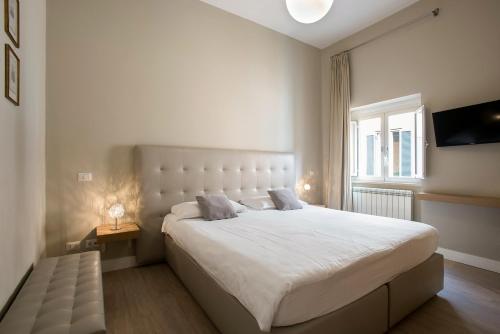 En eller flere senge i et værelse på Gonfalone 6