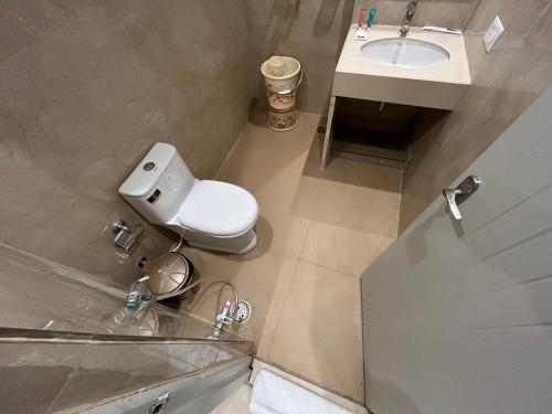 Koupelna v ubytování Hotel President