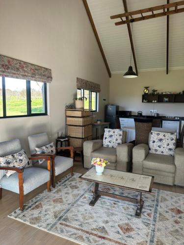 Posezení v ubytování Nguni Cottage
