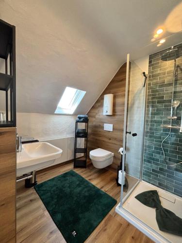 a bathroom with a sink toilet and a shower at harmony holiday, Pension in Kerschenbach