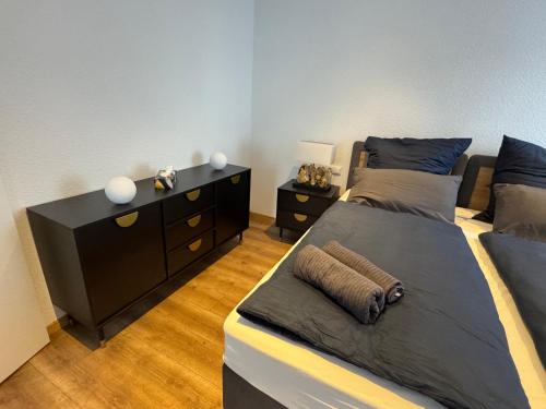 Giường trong phòng chung tại Heaven Estates Apartments Traben-Trarbach