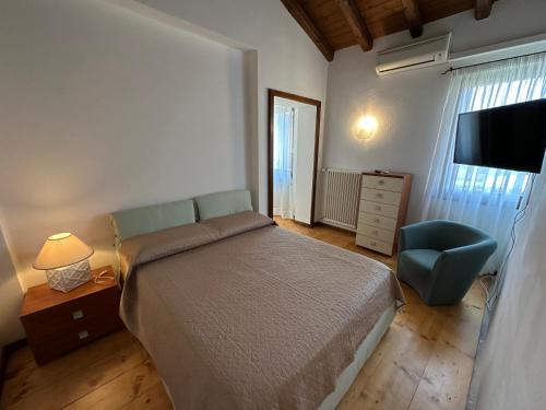 Katil atau katil-katil dalam bilik di Sottocastello Apartments