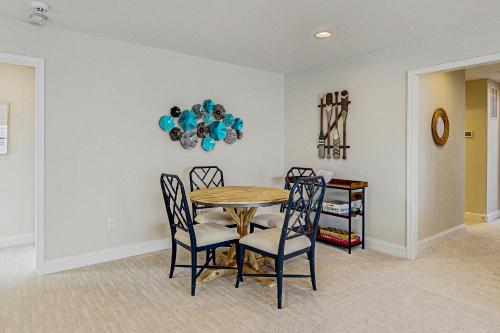 a dining room with a table and chairs at Marlin Chase --- 30347 Bermuda Dr in Ocean View