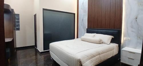 Katil atau katil-katil dalam bilik di Caesar Villa by POV