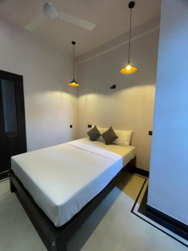 Giường trong phòng chung tại CASORA - Hiriketiya