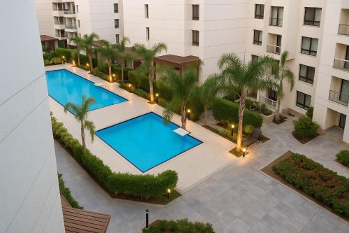 Πισίνα στο ή κοντά στο Dreamy Stay Porto Said