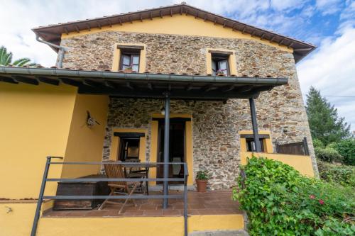 a view of the house from the outside at La Casona del Cura 3, CALÉNDULA in Pravia