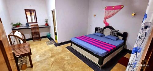 Katil atau katil-katil dalam bilik di Dilanya Homestay