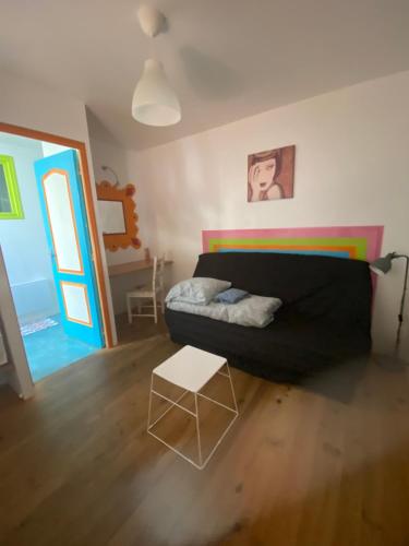 Postel nebo postele na pokoji v ubytování la Porte bleue