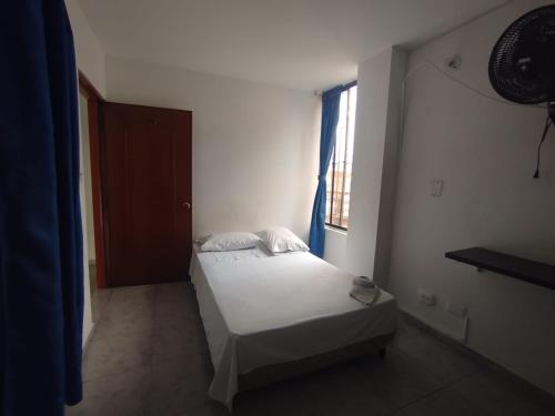 Postel nebo postele na pokoji v ubytování HOTEL LA FONTANA