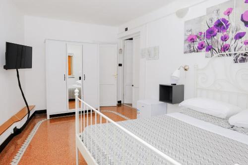 Postel nebo postele na pokoji v ubytování Hotel Caffaro