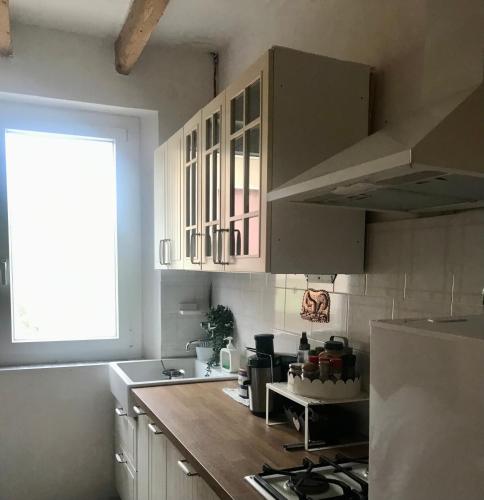 a kitchen with a sink and a counter top at Old school Bacedasco B&B in Vernasca