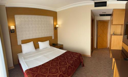 Mekanhan Hotelにあるベッド