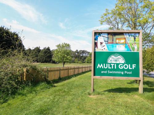 a sign for a nutitt golf and swimming pool at No 3 Foxburrow Hang in Fritton Norfolk