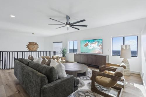 a living room with a couch and a table at The Grand Horizon in Vail