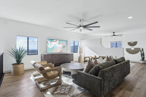 a living room with a couch and a table at The Grand Horizon in Vail