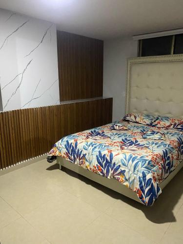 Ένα ή περισσότερα κρεβάτια σε δωμάτιο στο Apartamento amoblado en la ciudad de Pereira