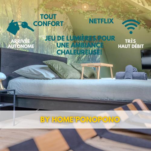a room with a bed and signs on the wall at La Suite Jungle - High Tech - NETFLIX - WIFI très Haut Débit in Vertou