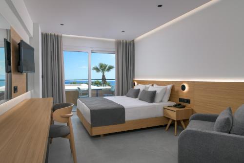 Postel nebo postele na pokoji v ubytování Sun Beach Resort